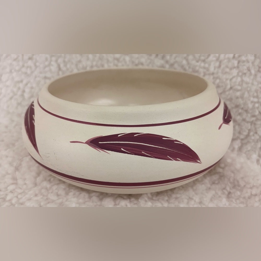 Vintage Native American Clay Pot with Feathers